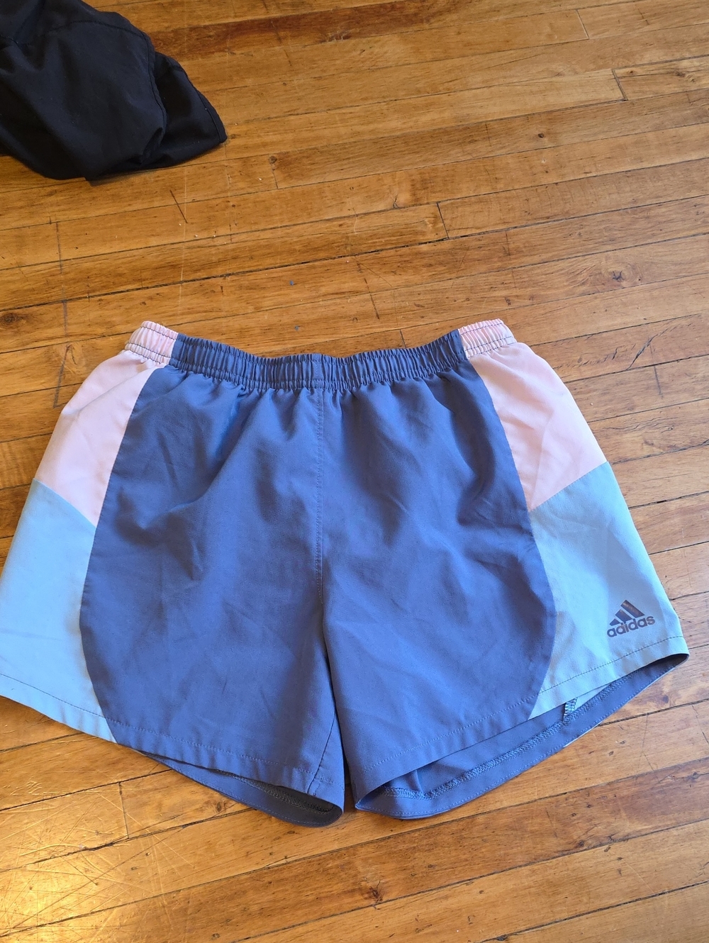 adidas navy blue athletic shorts with light pink trim